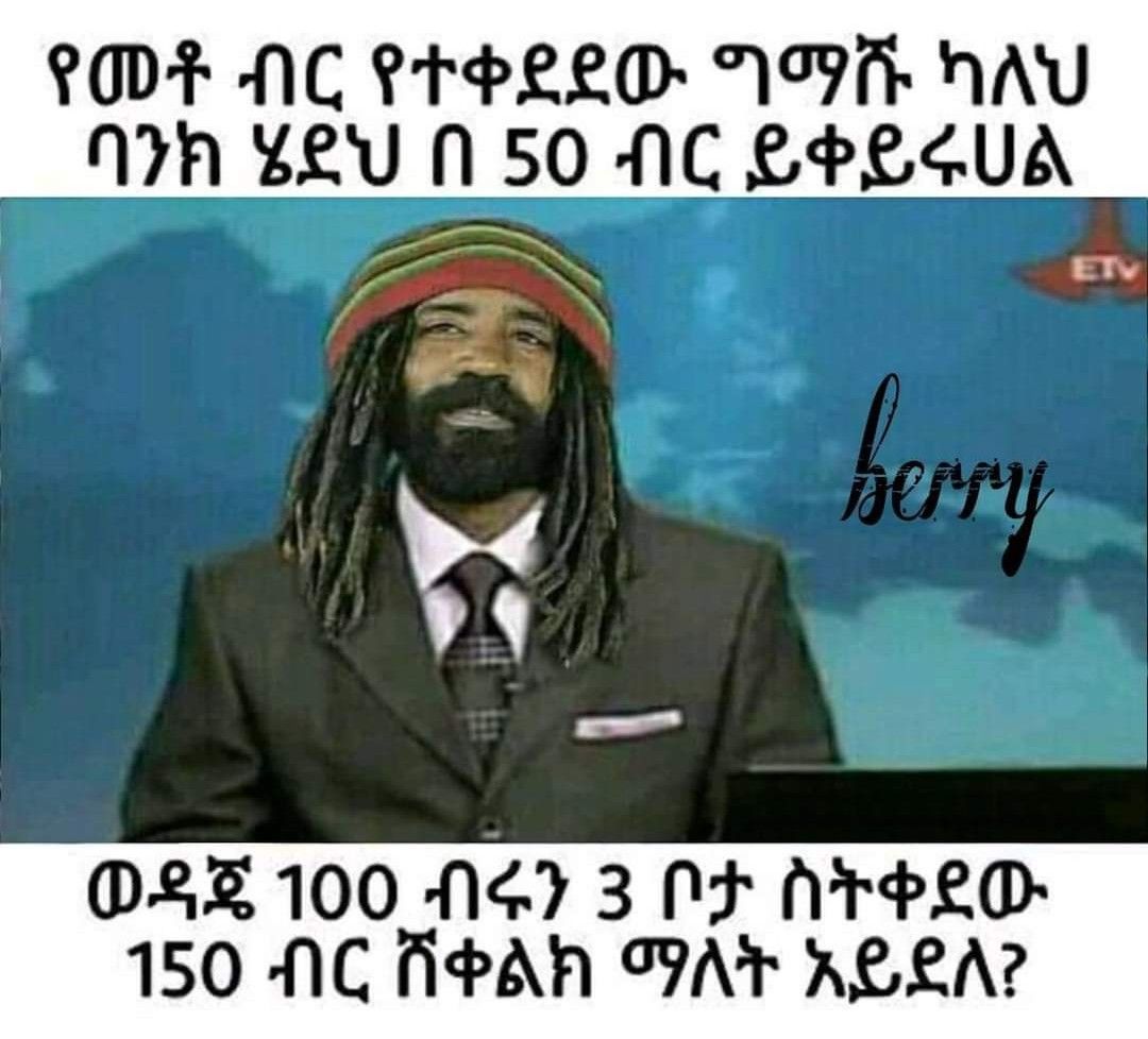 a man in a suit and tie with a beard